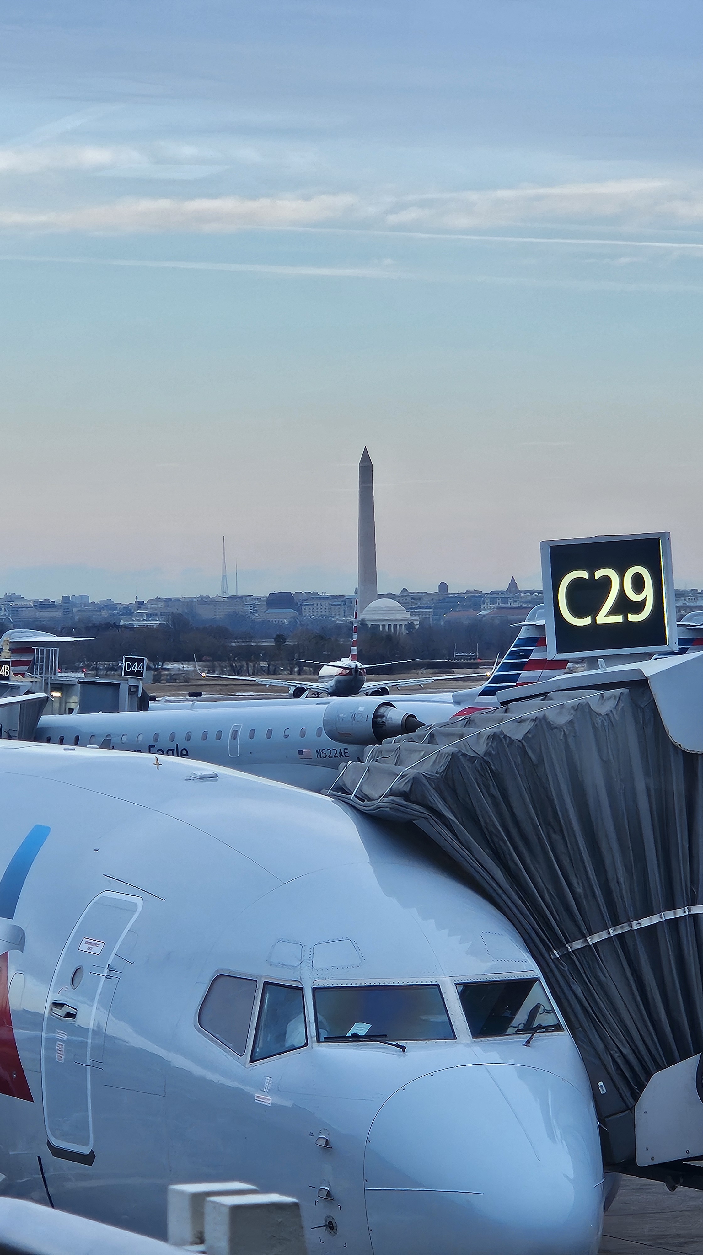 Image of an airplane at a bridgeway.